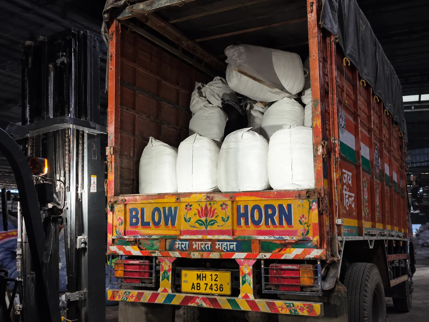 Large rolls of fabric secured for transport